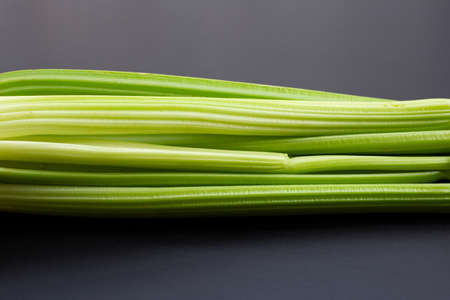 Fresh celery on dark background.の写真素材