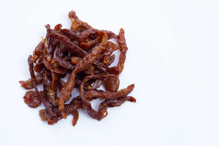 Deep fried sun-dried pork on white background.の写真素材