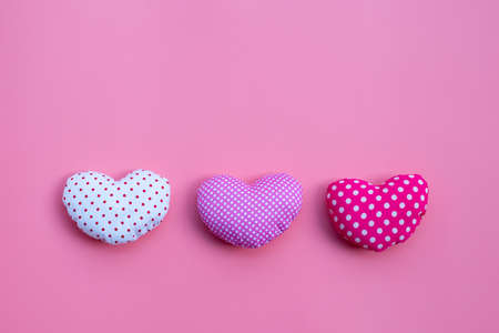 Valentine's hearts on pink background. Copy spaceの写真素材