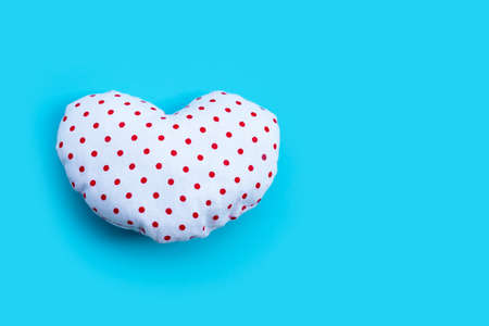 Valentine's heart on blue background. Copy space