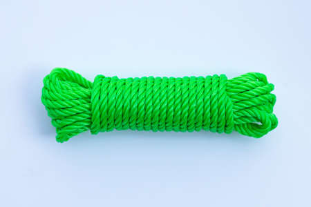 Green rope on white background.