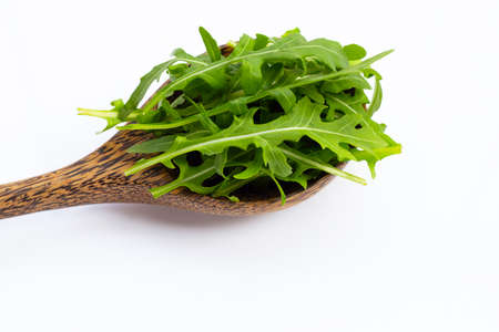 Fresh green rocket salad on white background.の写真素材