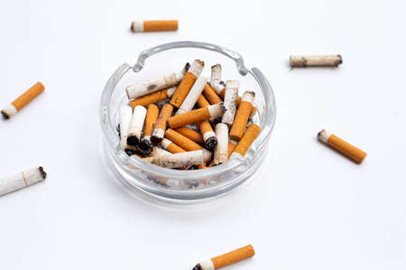 Smoked cigarettes on white background. Copy spaceの写真素材