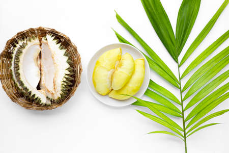 Fresh ripe cut durian on white background.