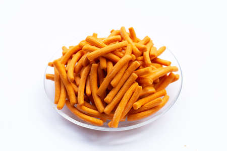Salt breadsticks on white background.