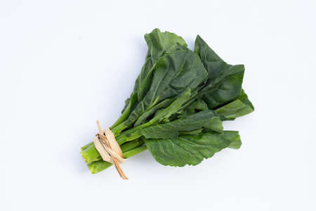 Collard green leaves on white background.の写真素材
