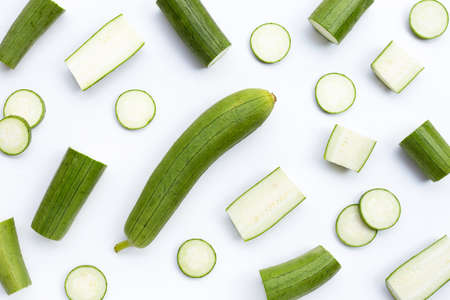 Fresh angled gourd on white background.の写真素材