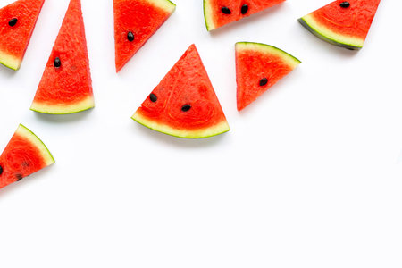 slices of watermelon isolated on white background, top view