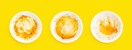 Dirty dishes on yellow background. Top viewの写真素材