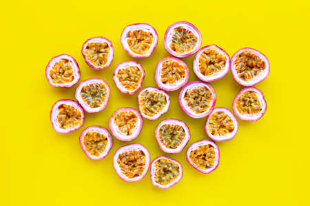 Passion fruit on yellow background.