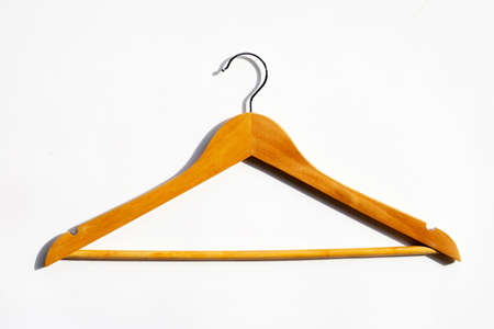 Wooden clothes hanger on white backgroundの写真素材