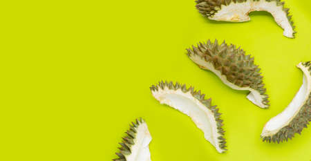 Durian peel on green background.の写真素材
