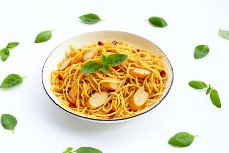 Spaghetti with dried chili and hot dogsの写真素材