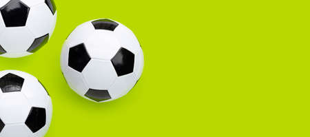 Soccer balls on green background. Top viewの写真素材