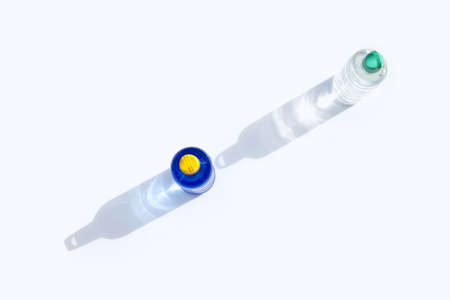 Plastic water bottles on white surfaceの写真素材