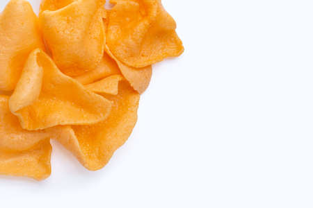 Prawn crackers on white background. Shrimp crispy rice snackの写真素材
