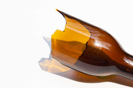 Broken bottle isolated on white background.の写真素材