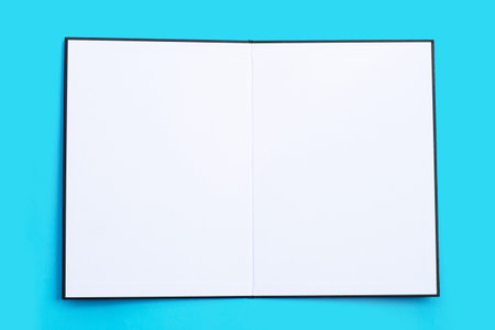 Empty paper folder on blue background.の写真素材