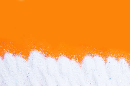 Detergent powder for clothes washing. Laundry concept.