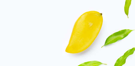 Tropical fruit, Mango with leaves on background. Top viewの写真素材