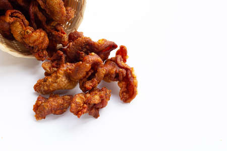 Chispy fried chicken skin on white background.の写真素材