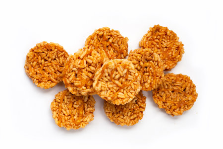 Rice cracker with coconut palm sugar on white