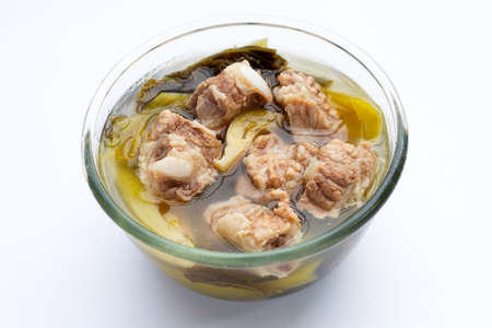 Pork rib soup with pickled cabbage or mustard greensの写真素材