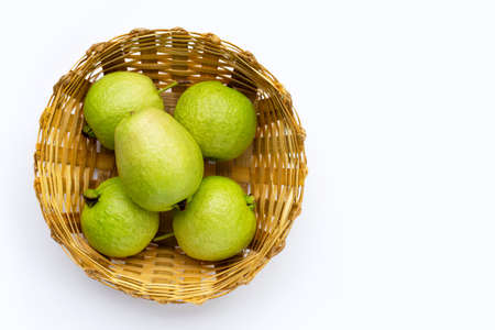 Fresh guava in bamboo basket on white background.の写真素材