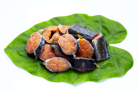 Catfish cut pieces on green leaf on white background.の写真素材