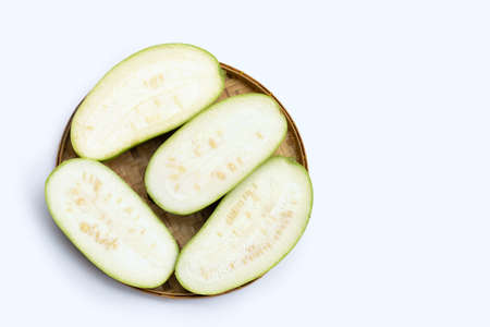 Winter melon in bamboo basket on white background.の写真素材