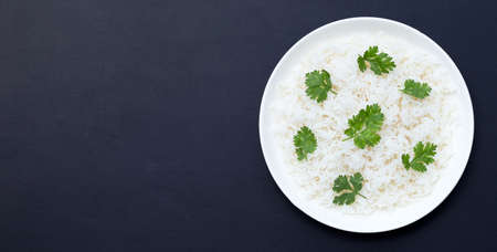 Dish of rice on dark background.の写真素材