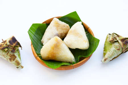 Grilled sticky rice in banana leave with mung beans fillingの写真素材