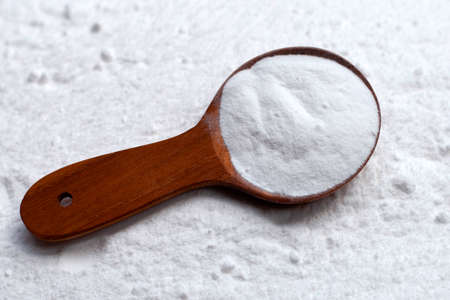Baking soda with wooden spoonの写真素材