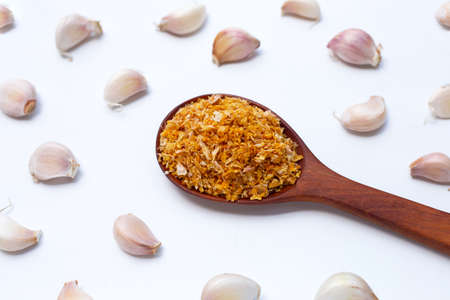 Fried chopped garlic on white background.の写真素材