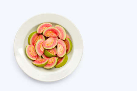 Fresh pink guava in white plate on white background.の写真素材