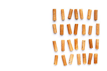 Thai crispy coconut rolls on white background.の写真素材