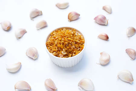 Dried chopped garlic on white background.の写真素材