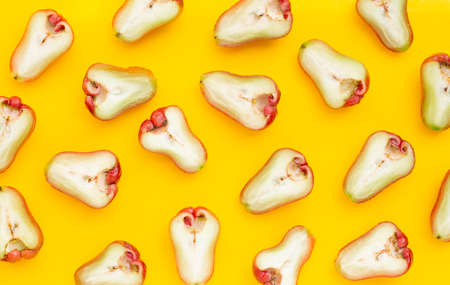 Fresh rose apple on yellow background.の写真素材