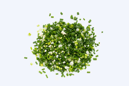 Chopped spring onions on white backgroundの写真素材