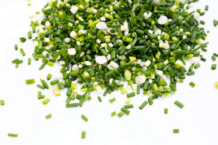 Chopped spring onions on white backgroundの写真素材