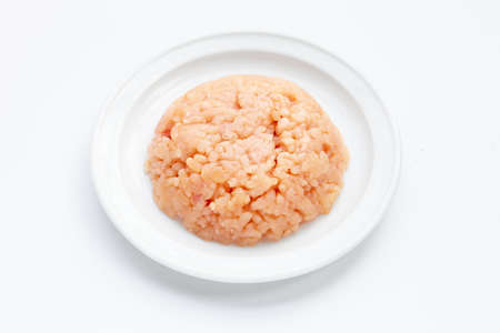 Minced meat of chicken fillet in white plate on white background.の写真素材