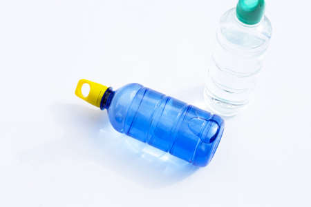 Plastic water bottles on white surfaceの写真素材