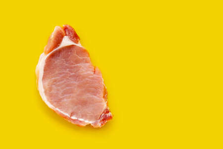 Fresh pork on yellow background.の写真素材