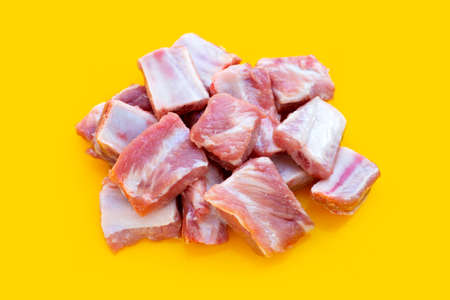 iRaw pork ribs on yellow backgroundの写真素材