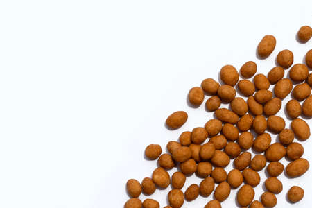 Crispy peanut snack balls on white background.の写真素材