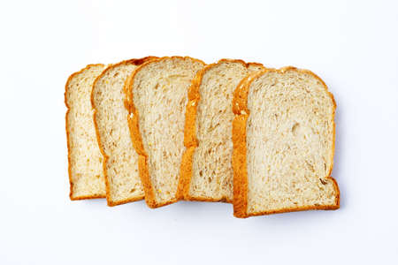 Sliced wholegrain bread on white background.