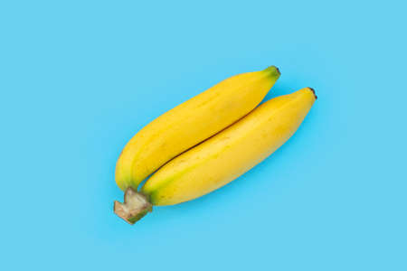 Banana fruit on blue background.の写真素材