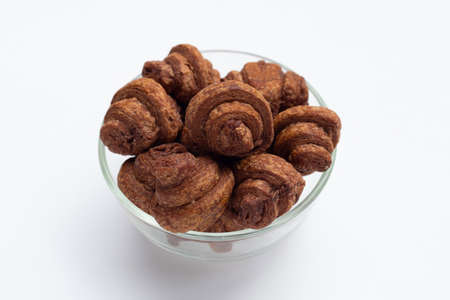 Mini chocolate croissant on white background.