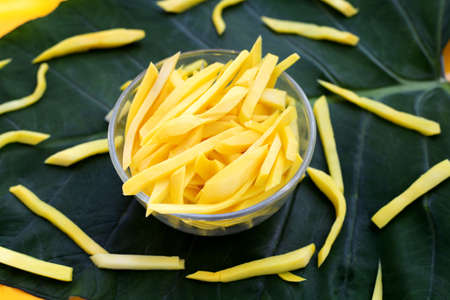 Preserved bamboo shoot on taro leafの写真素材