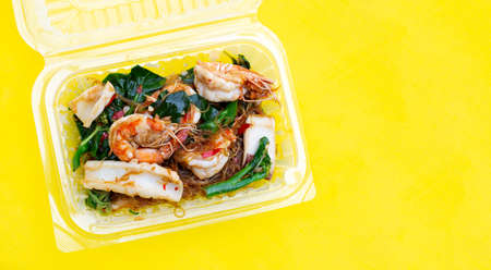 Spicy stir fried vermicelli with holy basil leaves and sea foodの写真素材